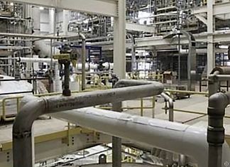 Nickel-containing stainless steel piping joins the various process stages.