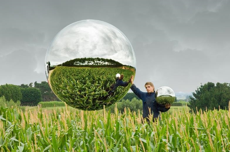 Wilbur Raikes pictured with 2.1 meter sphere.