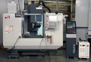 Phillips Additive Hybrid system, which integrates a Meltio wire-laser metal deposition head on a Haas TM-1 computer numerical control mil (Photo by Phillips Corporation).