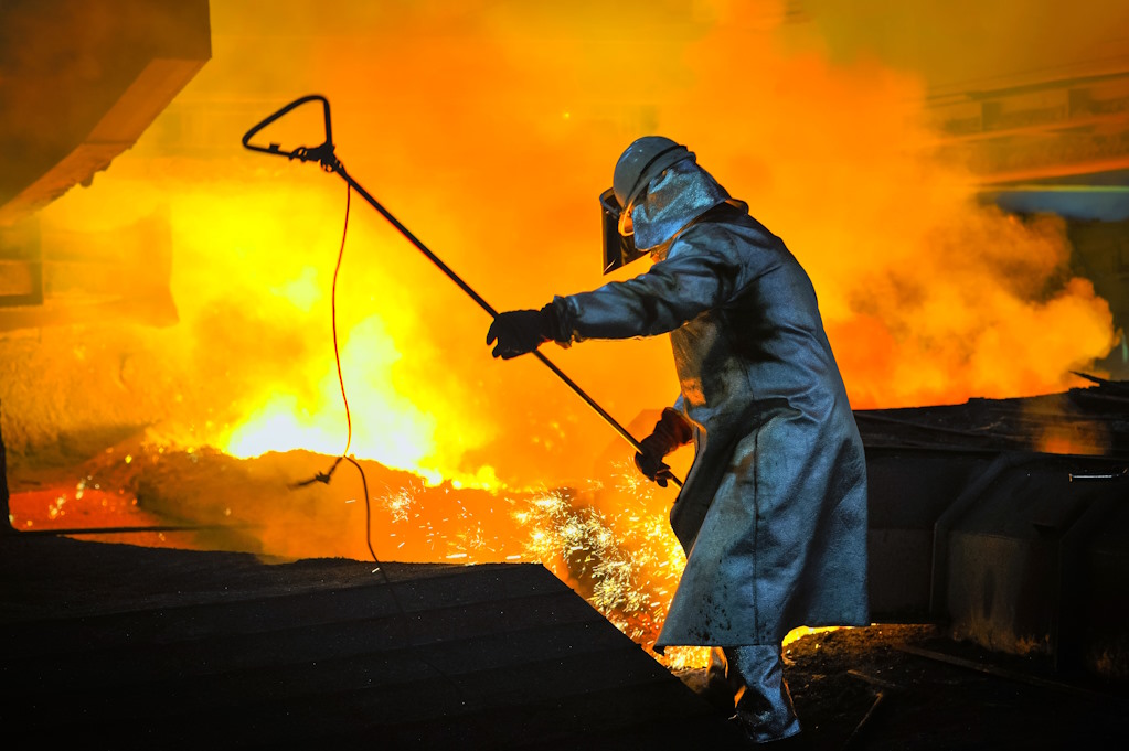 Protective clothing is essential for steel industry workers.