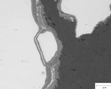 Figure 3b. Photomicrograph of the crack showing evidence of SRC