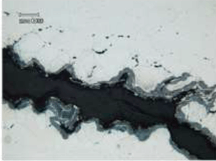 Figure 4b. Cracking of the alloy 800H transition cone with typical morphology of SRC